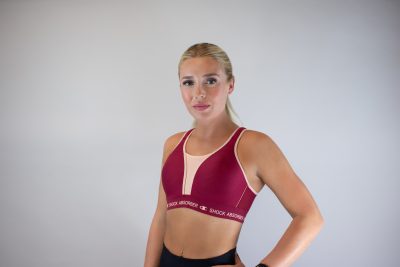 Shock Absorber RUN Padded -urheiluliivi. Color: Tibetan Red/ Peach. Front.