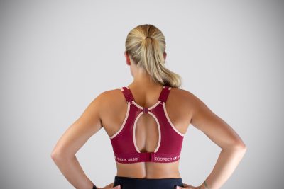 Shock Absorber RUN Padded -urheiluliivi. Color: Tibetan Red/ Peach. Back.